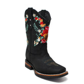 Black cowboy boot with colorful floral embroidery on a white background