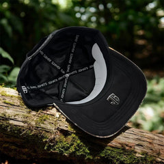 Interior view of the Charros de Jalisco Gallo Black/Camo snapback with adjustable snapback closure, premium sweatband, and branded interior taping.