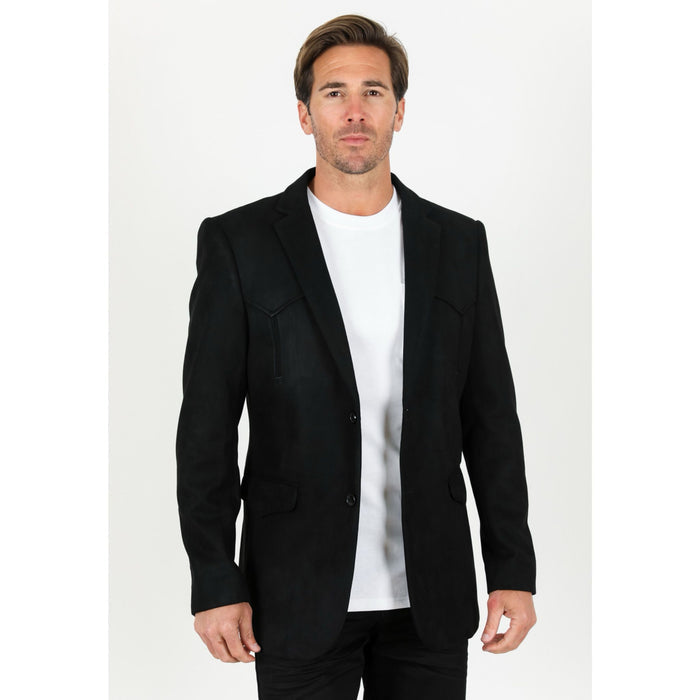 Man wearing a black blazer over a white shirt on a white background
