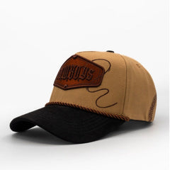 Tan and black cowboy snapback hat with embroidered rope detailing and western patch