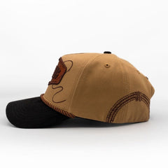 Western charro-style snapback hat with embroidered rope graphics and curved black brim