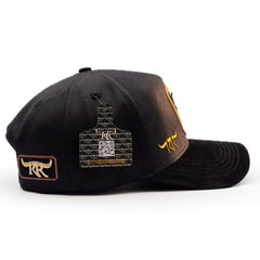 Western snapback cap with premium gold logo detailing and structured crown