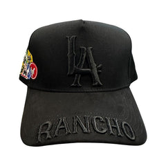 Black JG LA Rancho snapback hat with raised LA embroidery and Rancho stitched brim