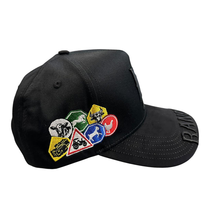 Side view of black western snapback hat with colorful ranch-inspired embroidered patches