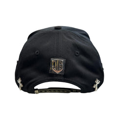Back view of black JG snapback hat with adjustable snapback closure and metallic logo emblem