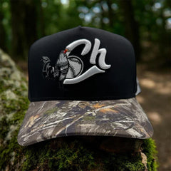 Front view of Charros de Jalisco Gallo Black/Camo snapback cap by JG Hats featuring embroidered Ch rooster logo and camouflage flat bill