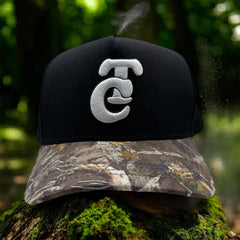 Front view of JG Hats Culiacán Sombreriza camo snapback featuring raised embroidered C logo and camouflage flat bill.